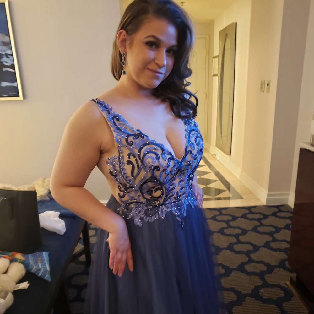 Beautiful dress for a formal even. Tulle multi color, sheer, lace with bedazzle